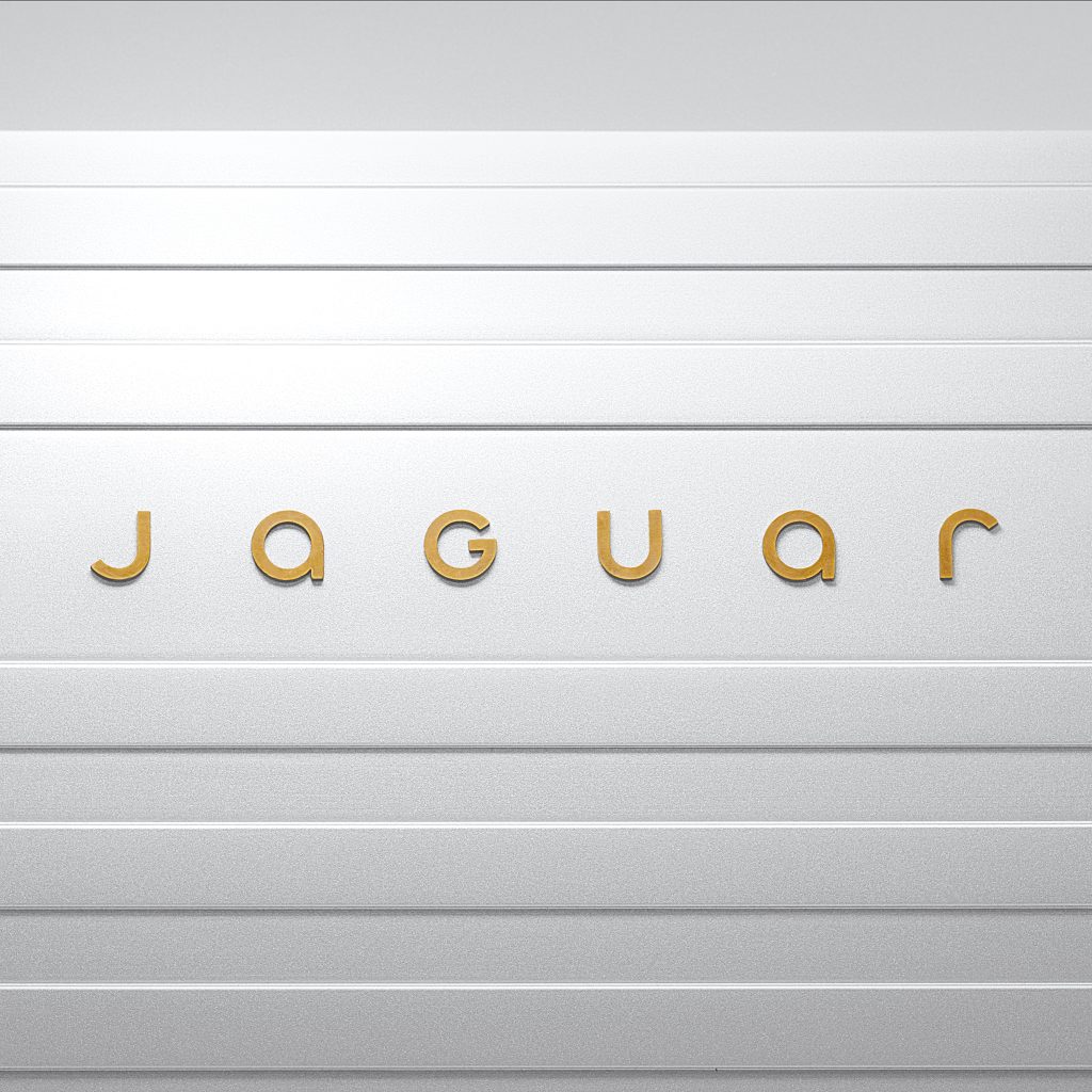 Device Mark: Jaguar's new device mark is its signature.
 It is a powerful celebration of modernism - geometric form, symmetry and simplicity - demonstrating the unexpected by seamlessly blending upper and lowercase characters in visual harmony.
 Strikethrough: This bold linear graphic generates an unmistakeable presence and an immediately recognisable visual for Jaguar, striking through imitation and the ordinary.