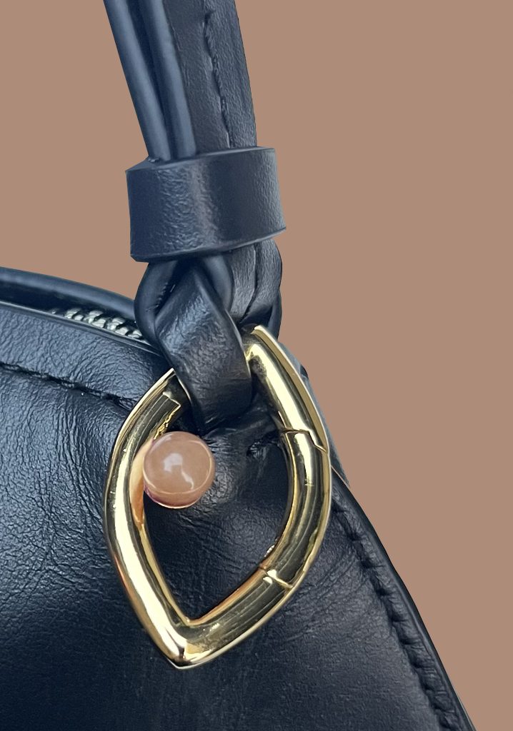 Capsule Jewelry Styled as a Bag Charm